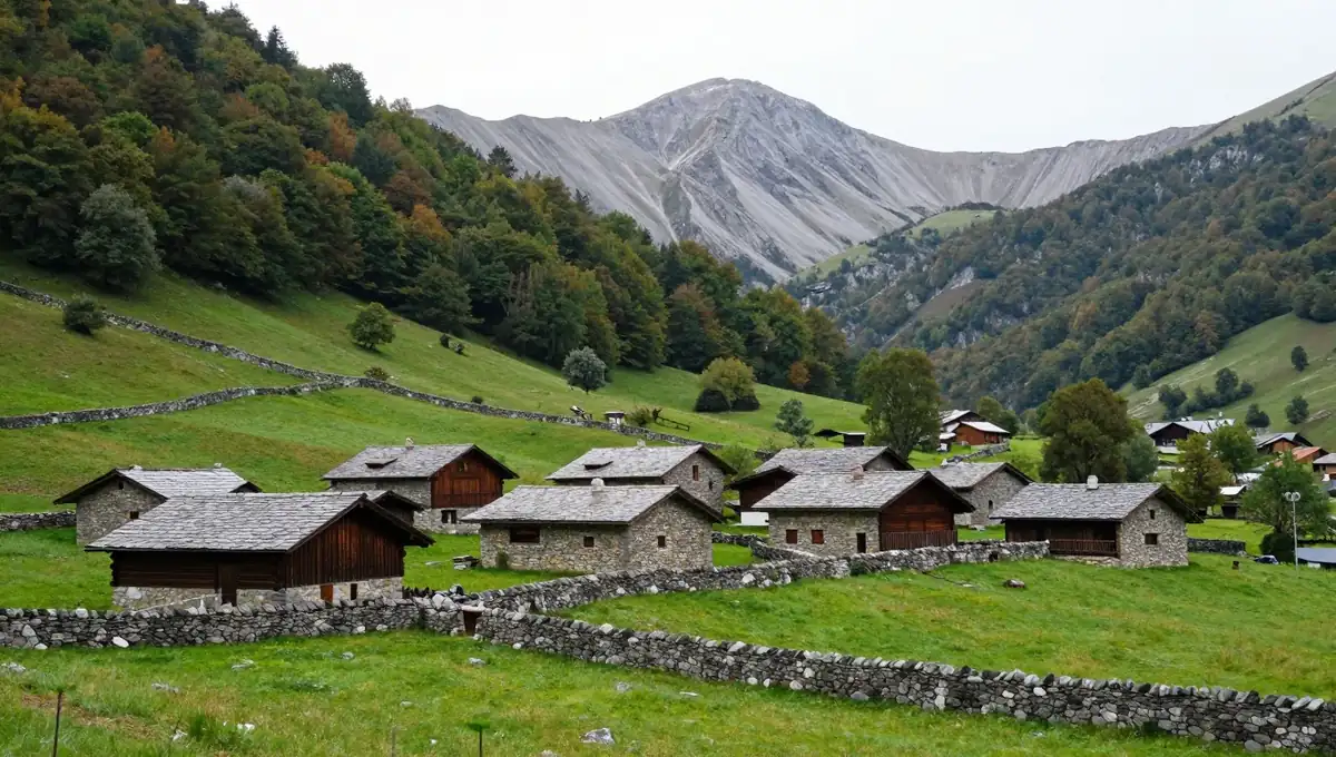 Stone houses and meadows edged with dry-stone walls in a village of the Bullón valley, Pesaguero, Liébana
